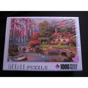 NEW Mini Puzzle 1000 piece puzzle of a Cottage by a River with Pink Tree CUTE!